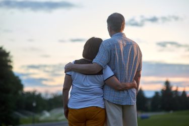 Back View Hugging Couple.