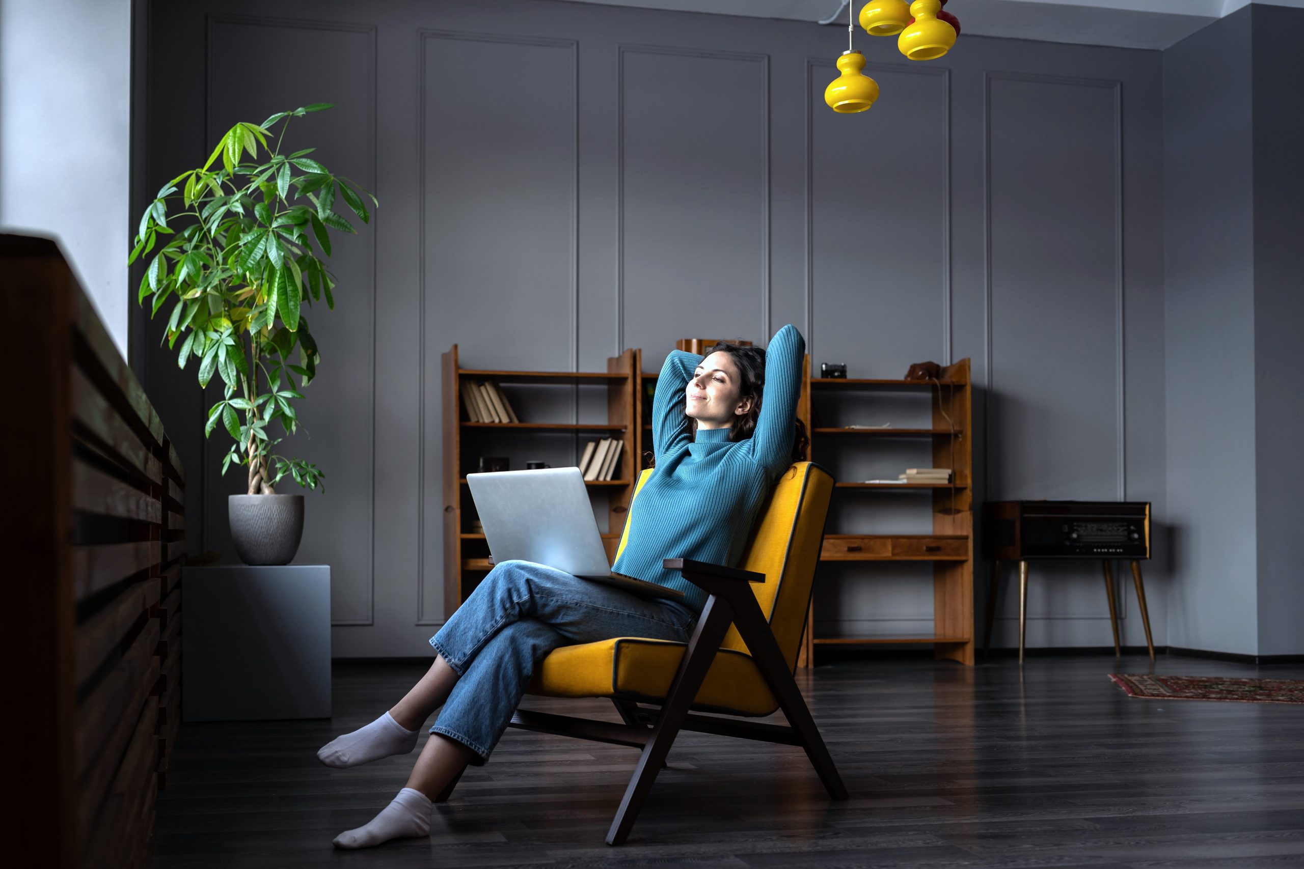 Dreamy Woman Rest After Finished Work Look In Window Sitting Stretching Hands Behind Head Relaxing